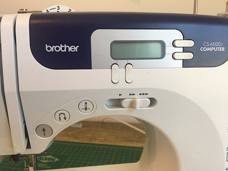 Button controls on brother sewing machine