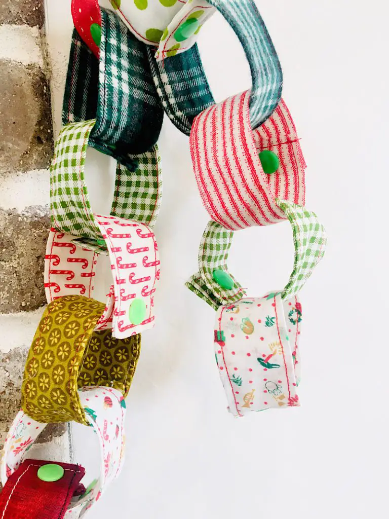 Fabric paper chain christmas countdown hanging on wall