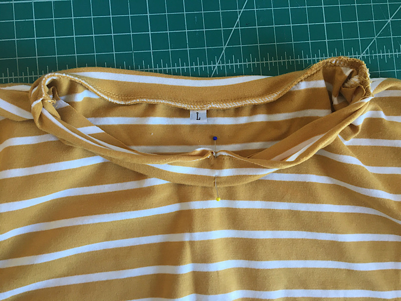 pin neckband to t shirt