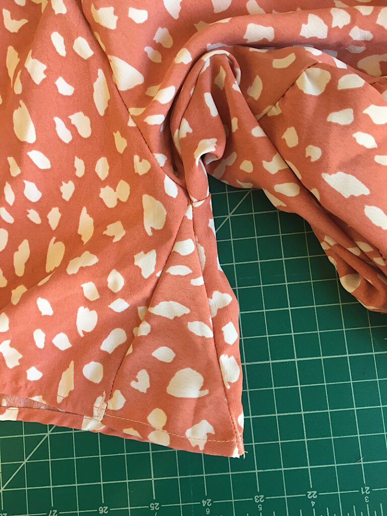 a triangle shaped gusset on a tight sleeve