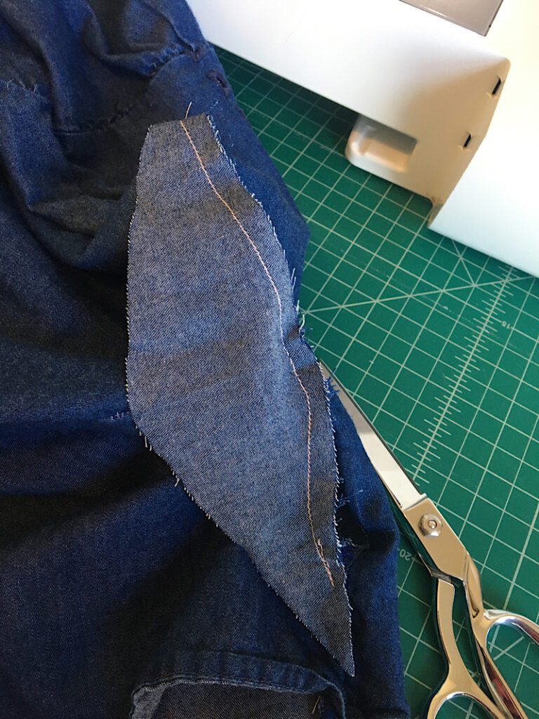 sewing the diamond underarm gusset to the shirt