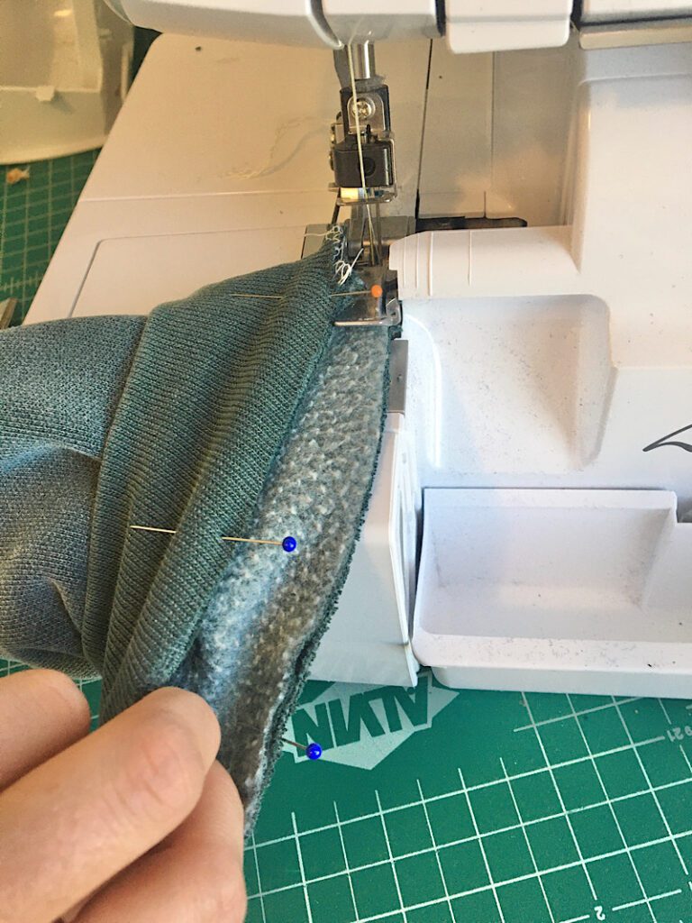 stretching the cuff as you sew