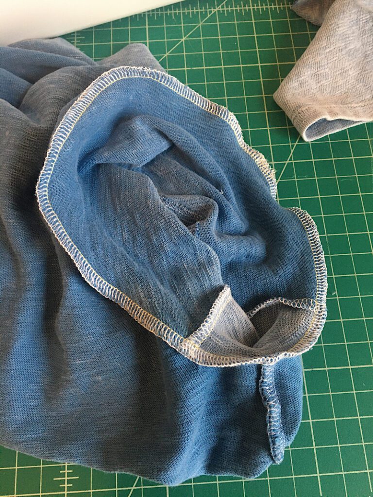 sewing the sleeve into the shirt