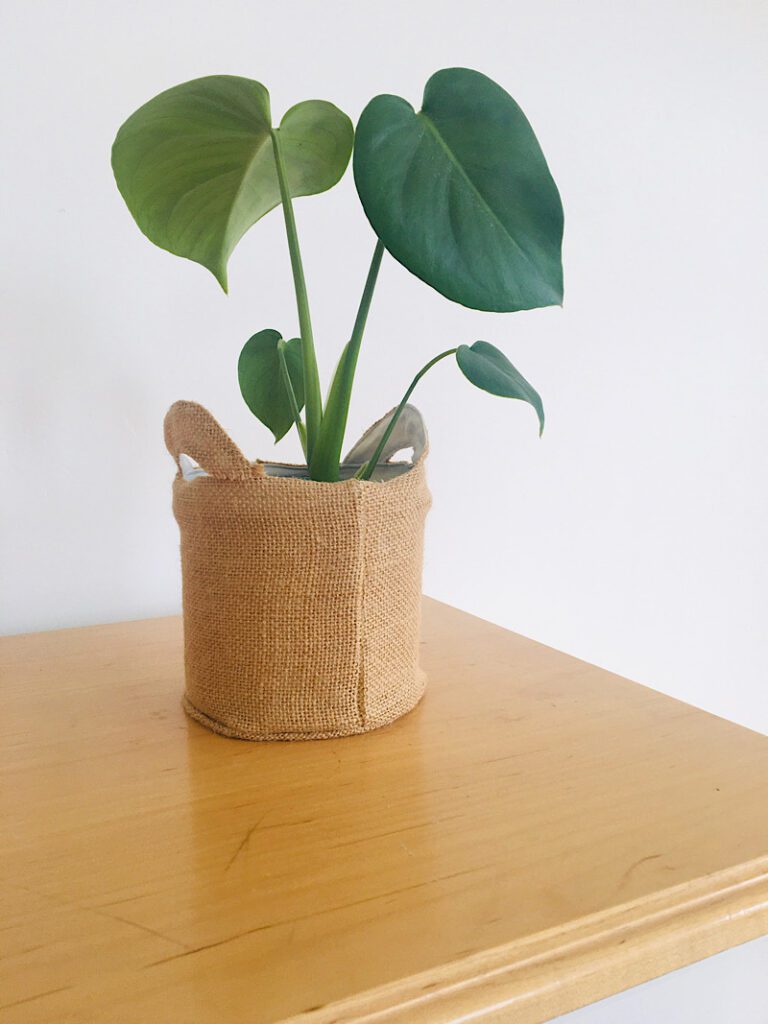 diy burlap planter basket on dresser with plant
