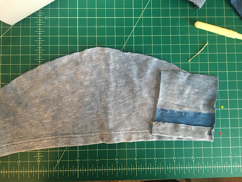 pinning the panel to the sleeve