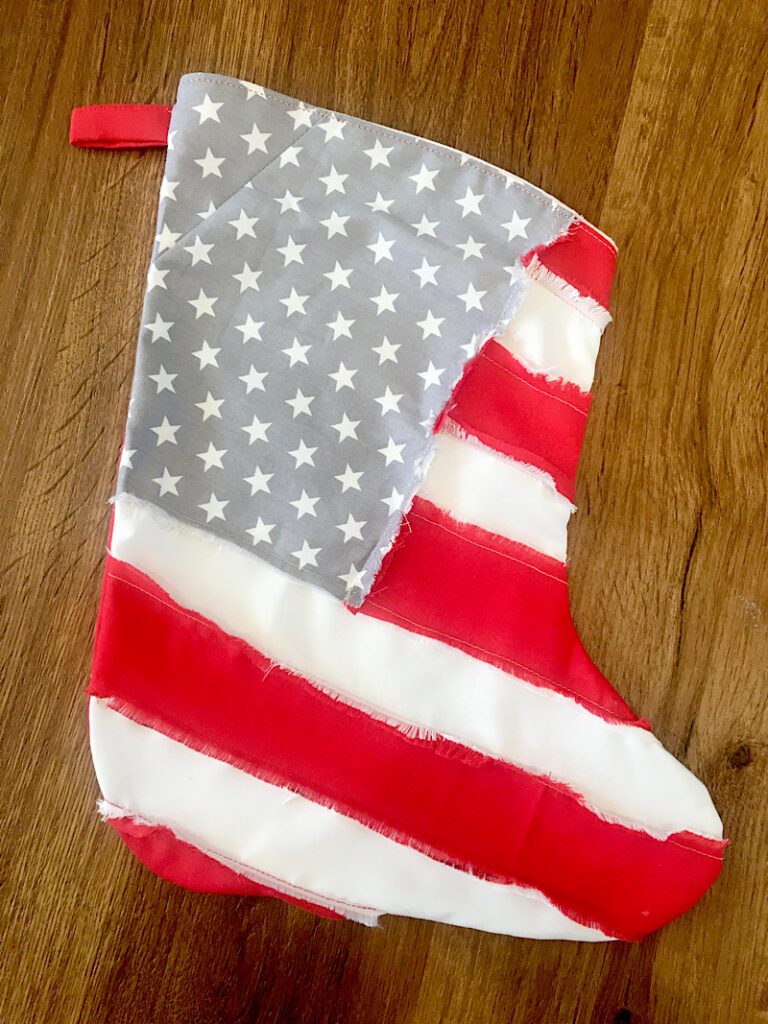 finished american flag stocking  on wood floor