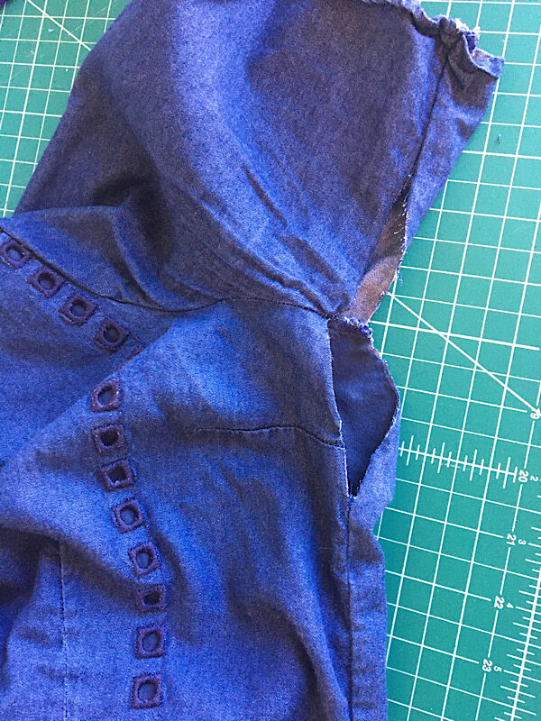 opening the side armpit seam on a shirt to add a diamond gusset