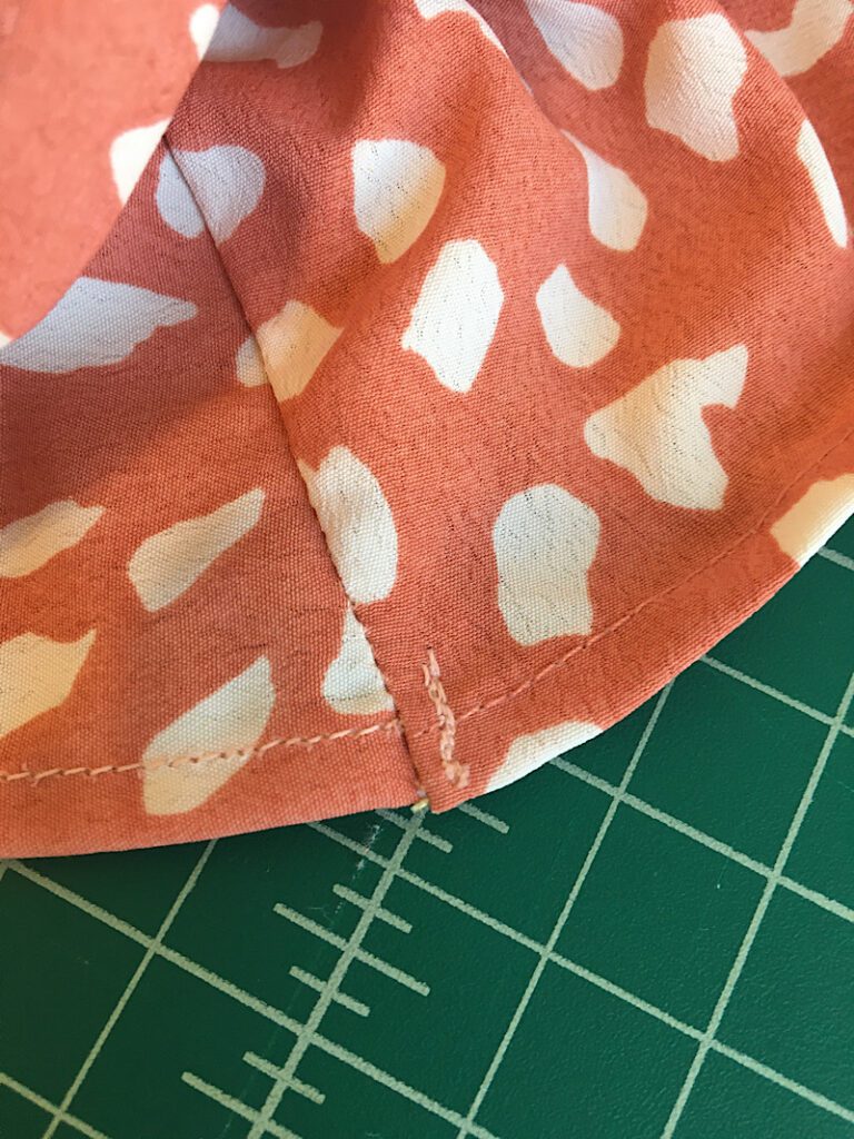 stitch line to flatten gusset on sleeve
