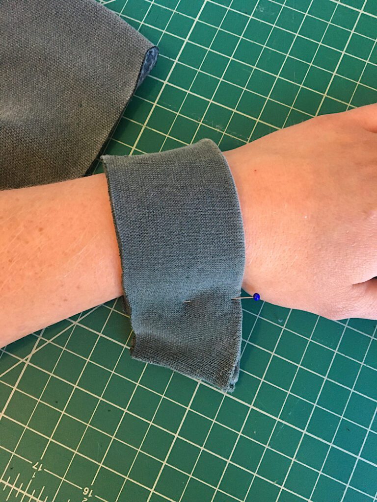 pinning the cuff on wrist