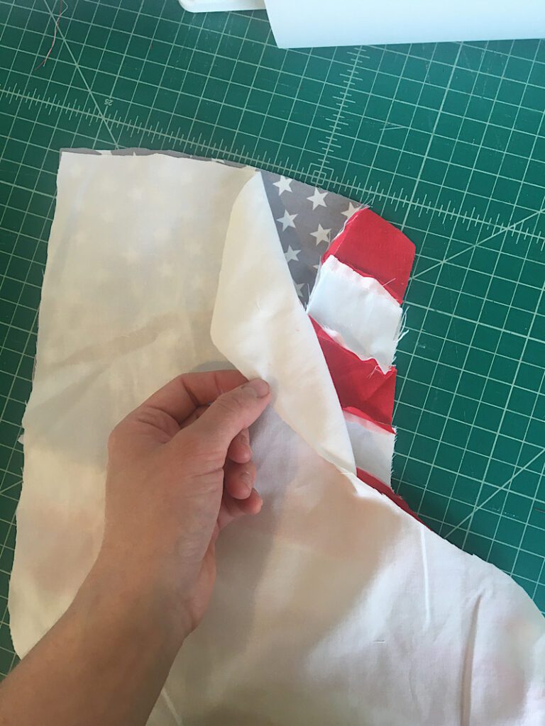 place the lining on top of the flag stocking front