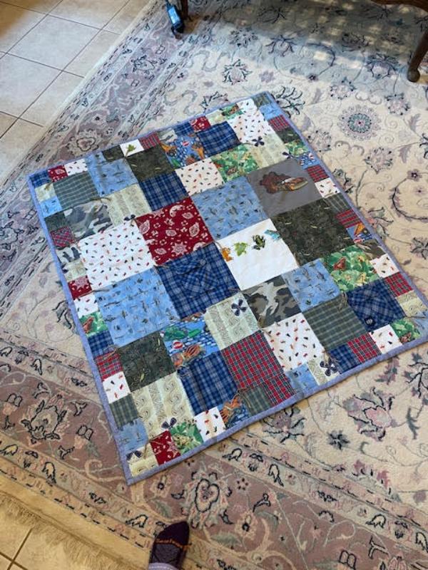 blue quilt made from baby boy clothes