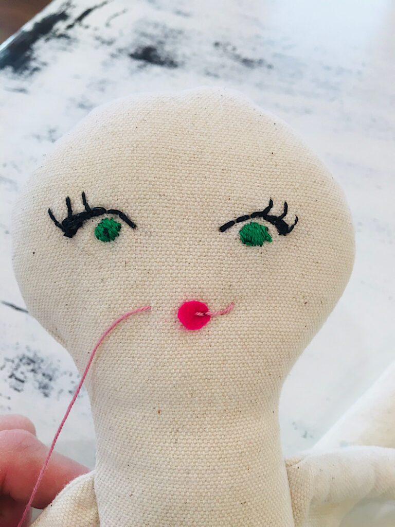 starting to embroider the right side of the mouth