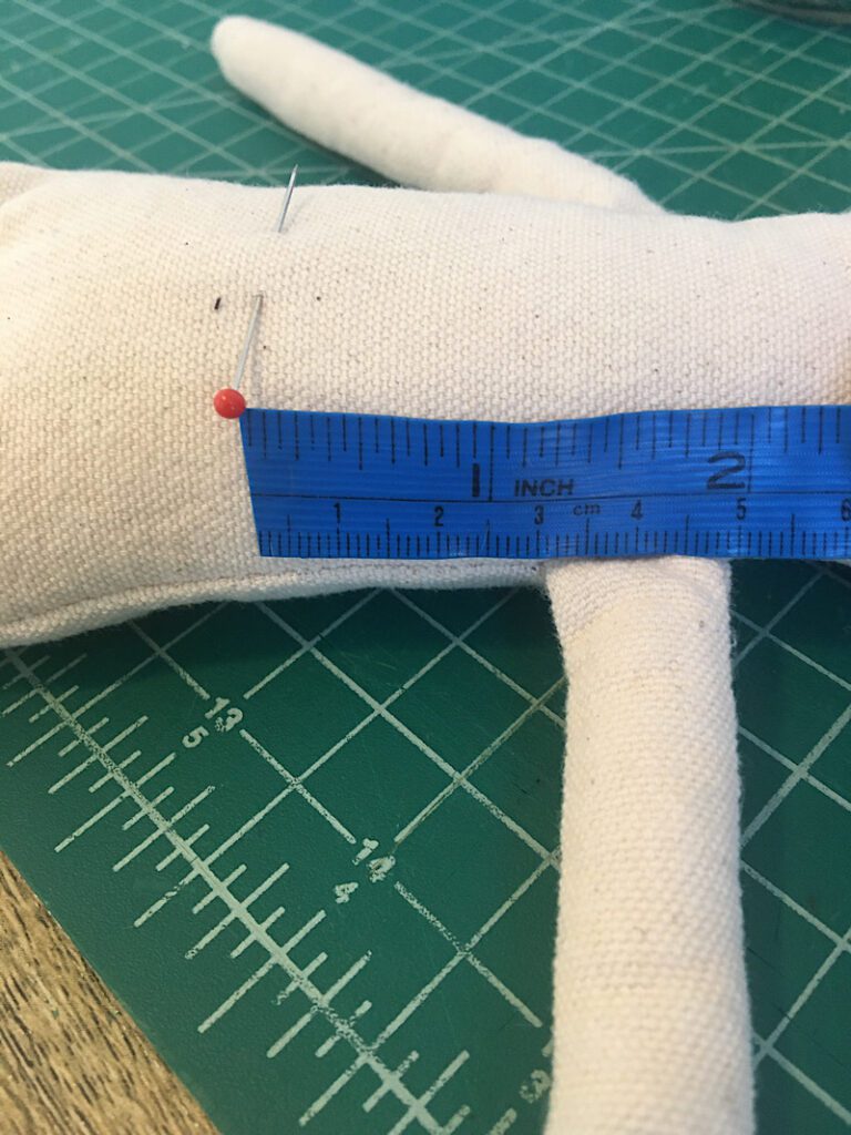measuring the rag dolls side seam