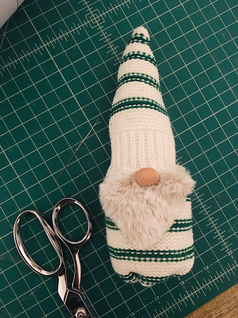 sew the nose of the gnome to the body