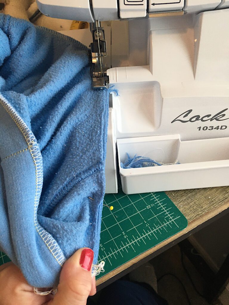 pulling the hoodieneck line to sew on neckband