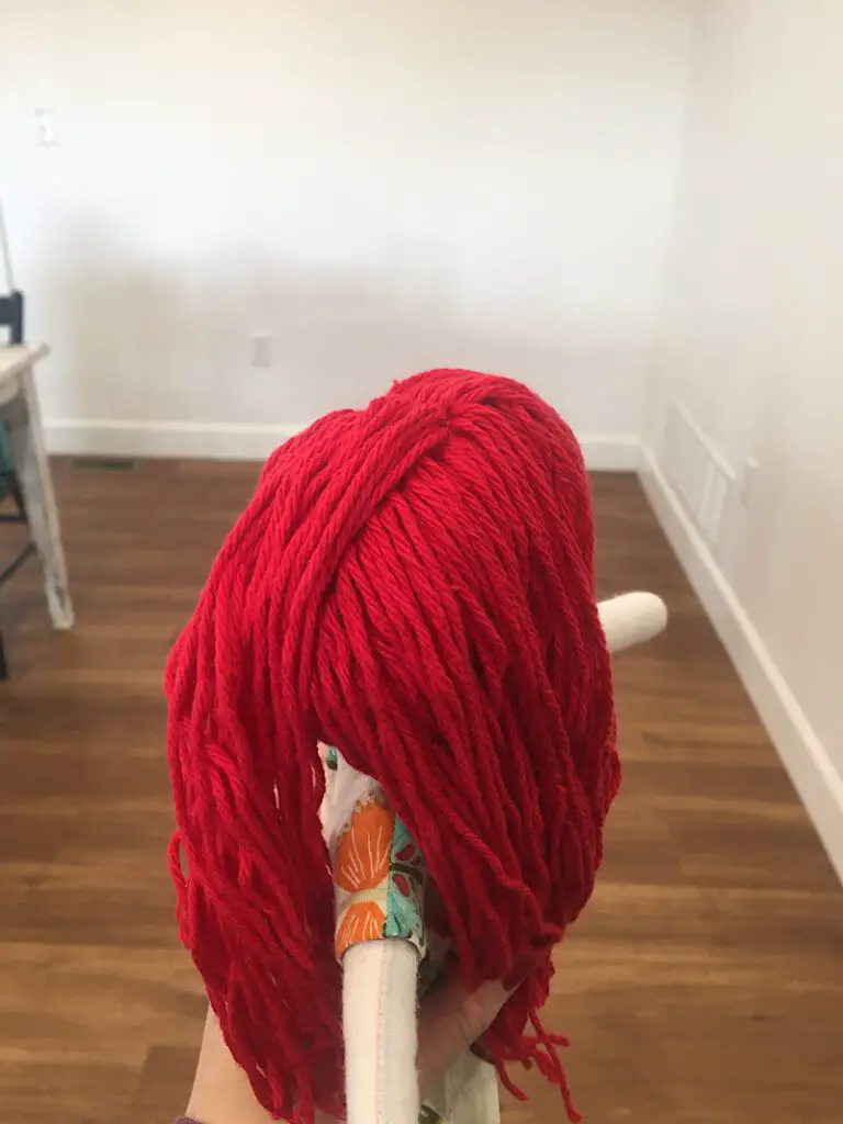 back of rag doll yarn hair head
