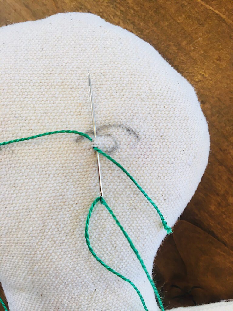 making the satin stitch for a doll eye