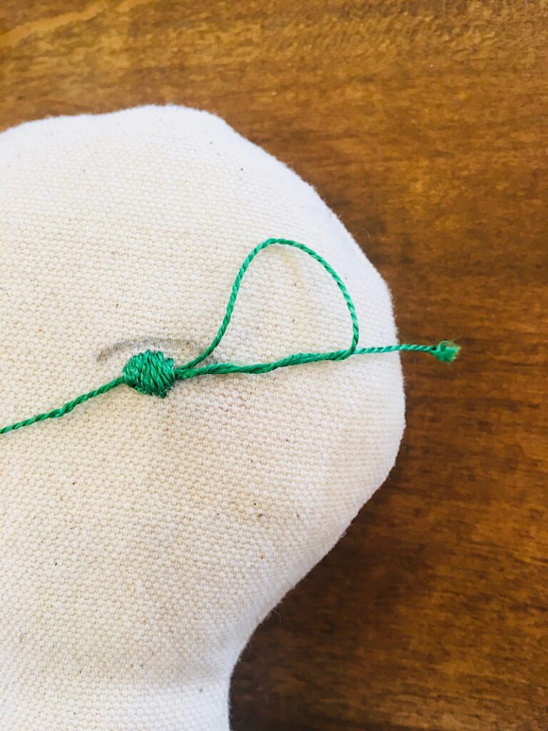 wrapping the embroidery thread into a loop