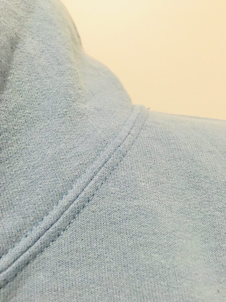 coverstitch around the neck of a hoodie