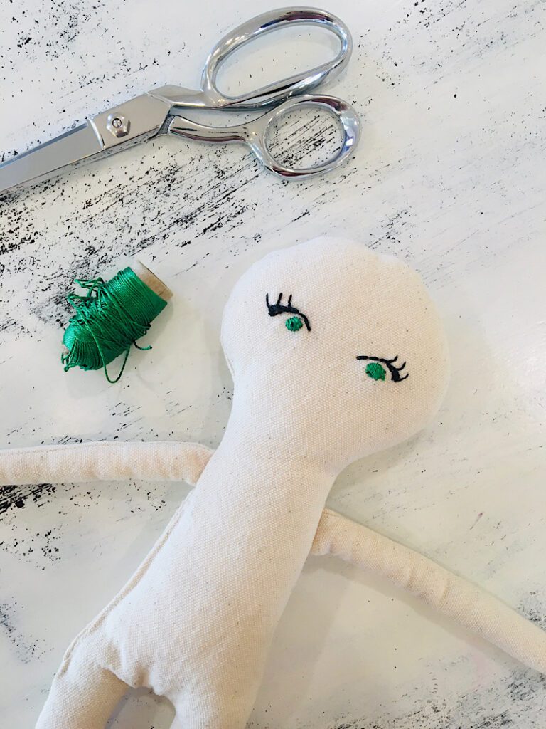 finished Doll embroidered green eyes