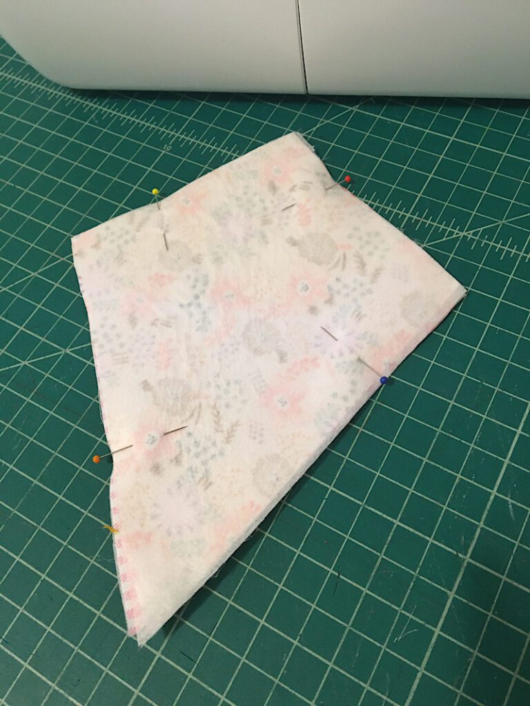 pin around the edges of fabric kite