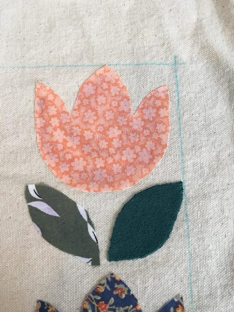 tulip glued to fabric on pillow cover