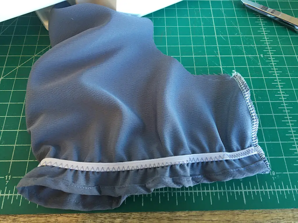 sew down side seam of gathered elastic sleeve