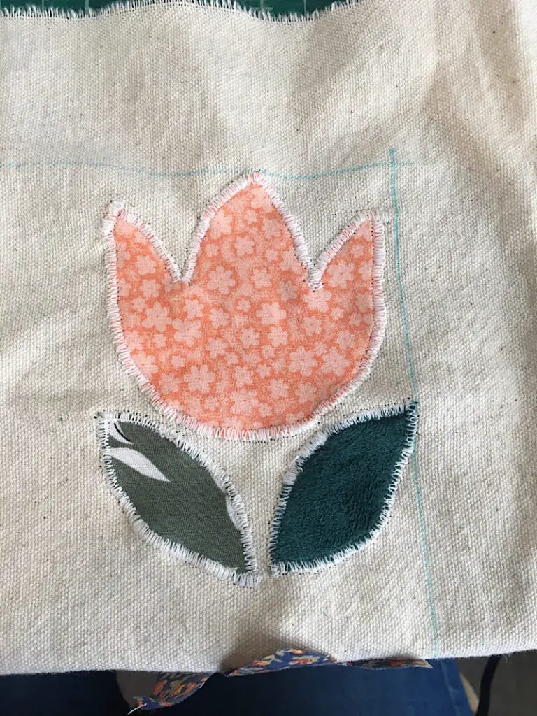 completed tulip applique on pillow cover