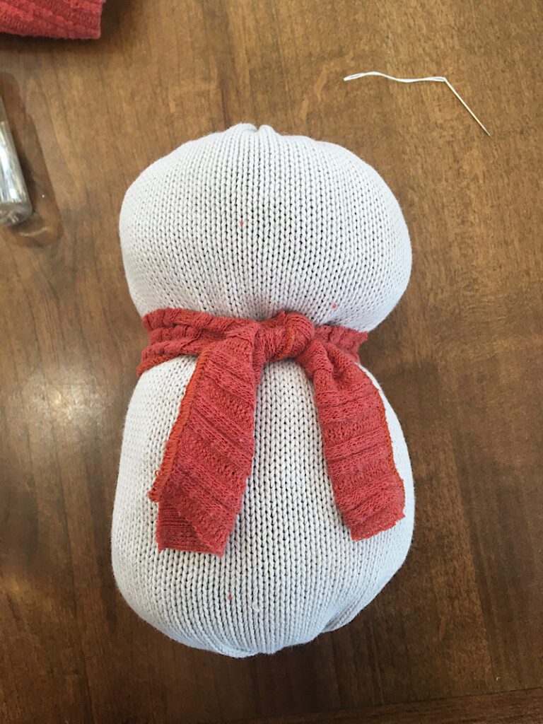 tie it around snowman neck