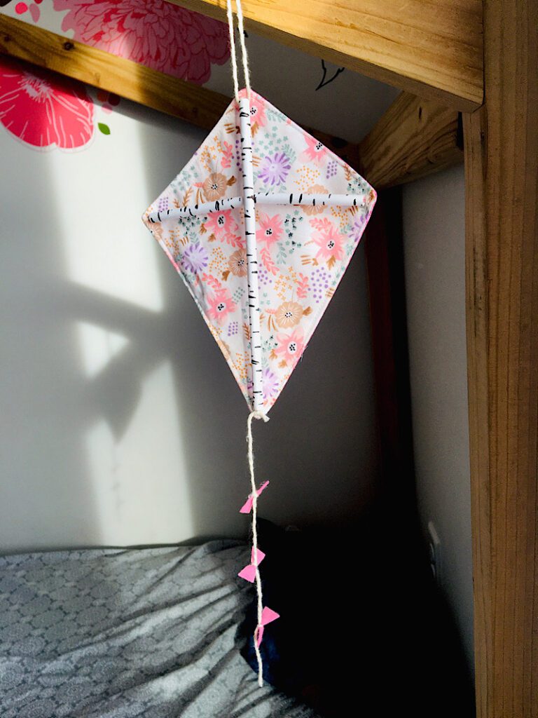 kite decoration on a bed
