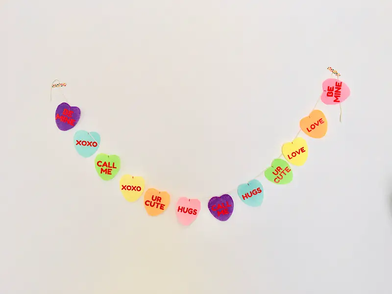 Valentines day heart garland hanging on wall