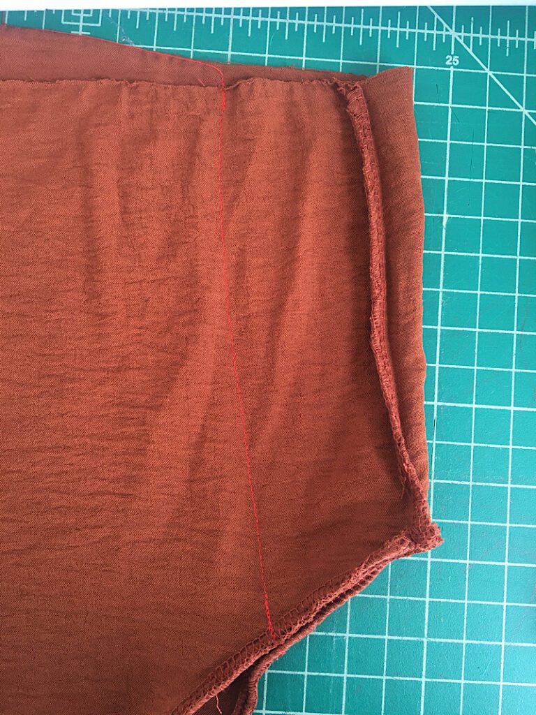 sew down the side seam of the bodice of a large dress