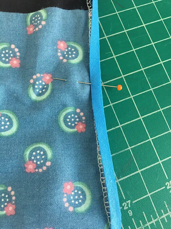 pinning the binding on the pot holder