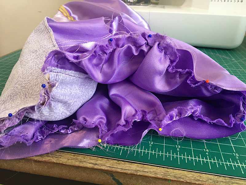 pinning the skirt to the bodice