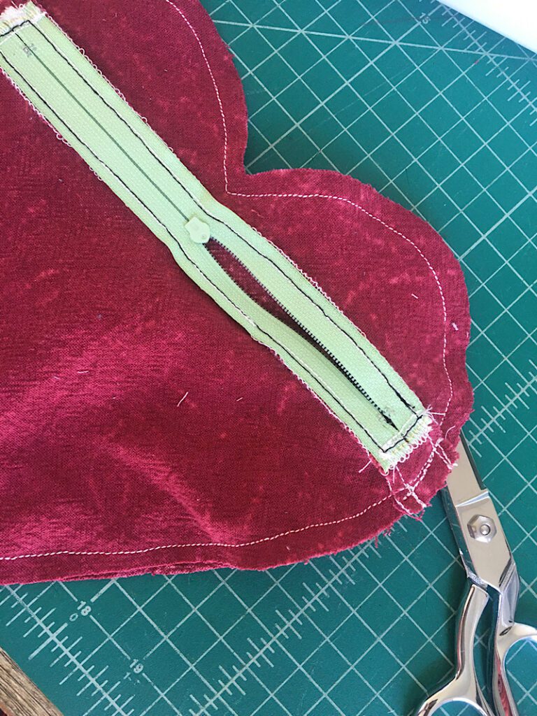 sew around edges of heart clutch