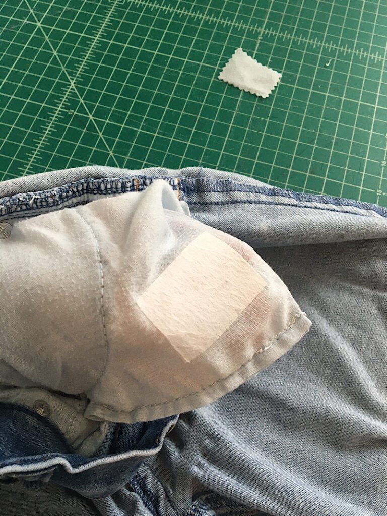 patch on pocket hole of jeans front pocket