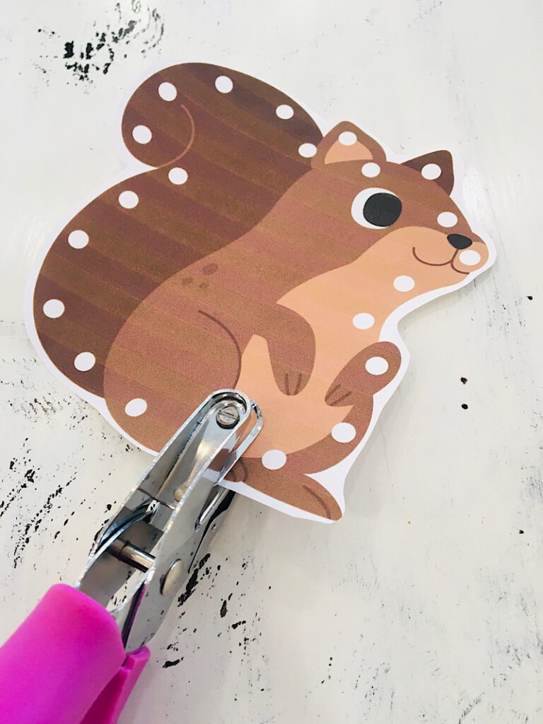 punch holes on squirrel lacing card