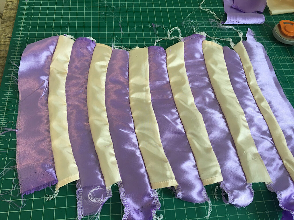 Sewing together stripes for rapunzel sleeves