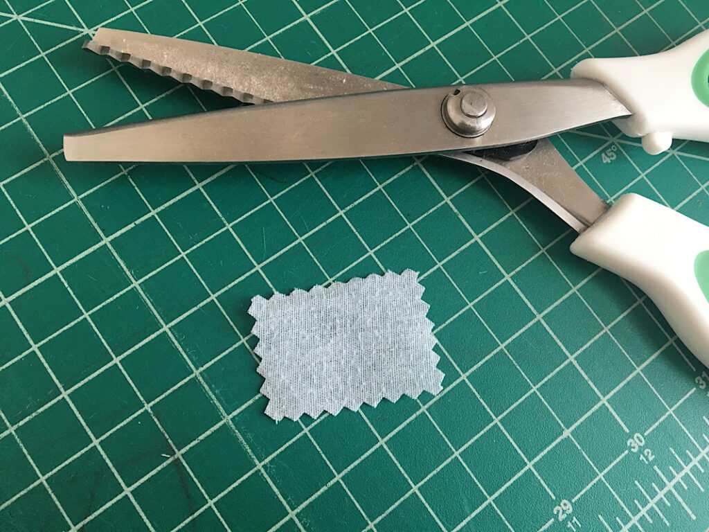 using pinking shears to cut a patch