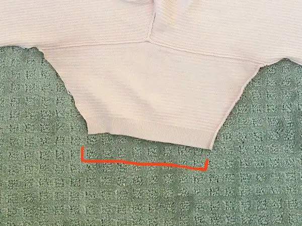 measuring the hem of a tight sleeve