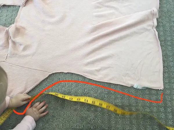 measuring the side seam of a shirt