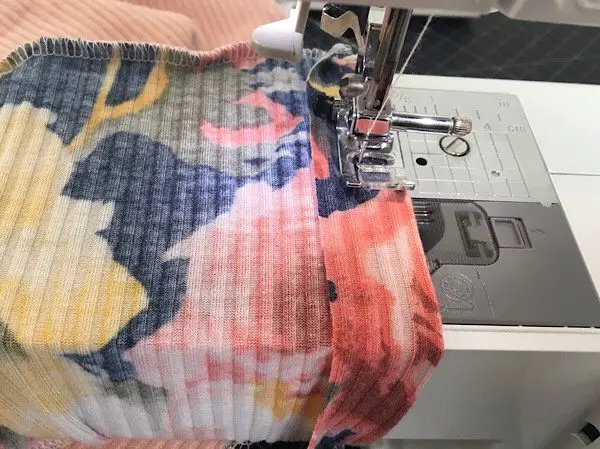sewing the panels on the side of a shirt