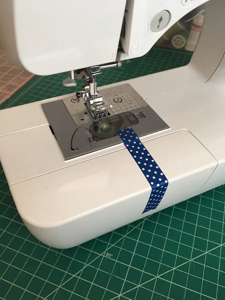 use tape on your sewing machine as a seam guide