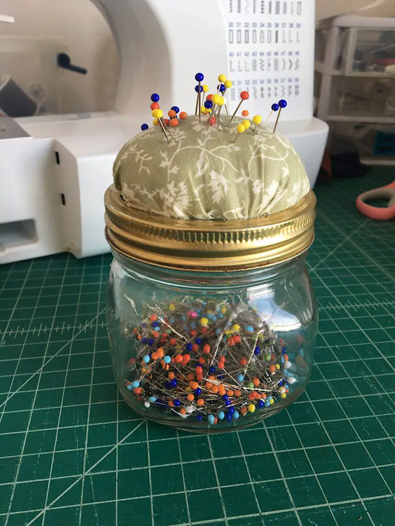sewing pins in a mason jar