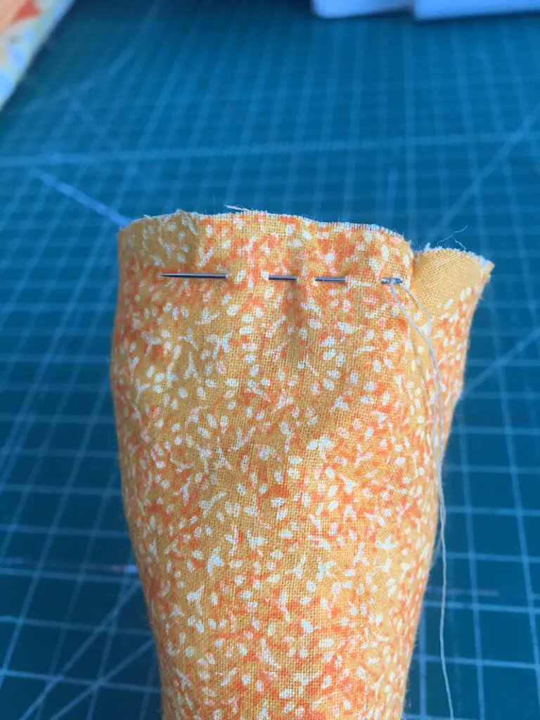 sewing the top of the carrot
