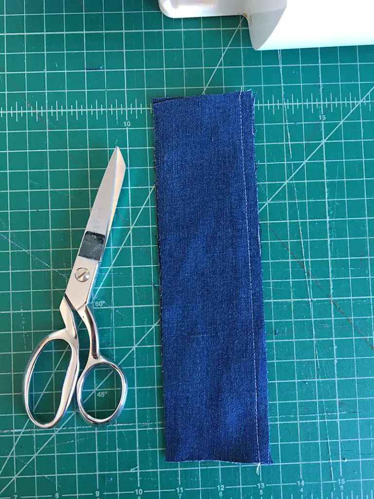 Sewing the denim strips together for the front of the hot pad