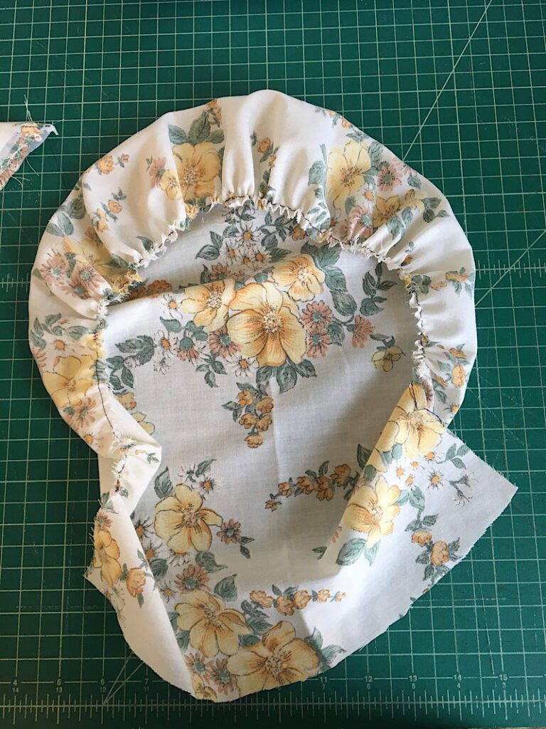 Gathered bonnet cap ready to be sewn to the brim