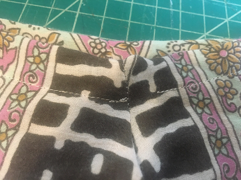 sewing the hem of the waistband for doll pants