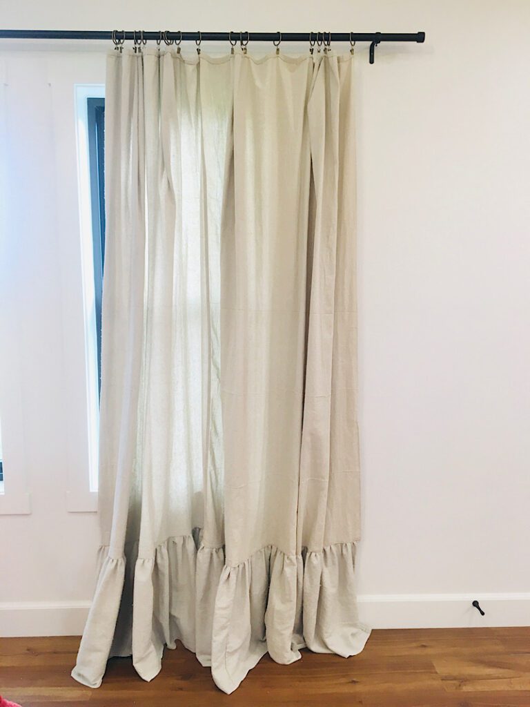 diy drop cloth curtains hanging on a window