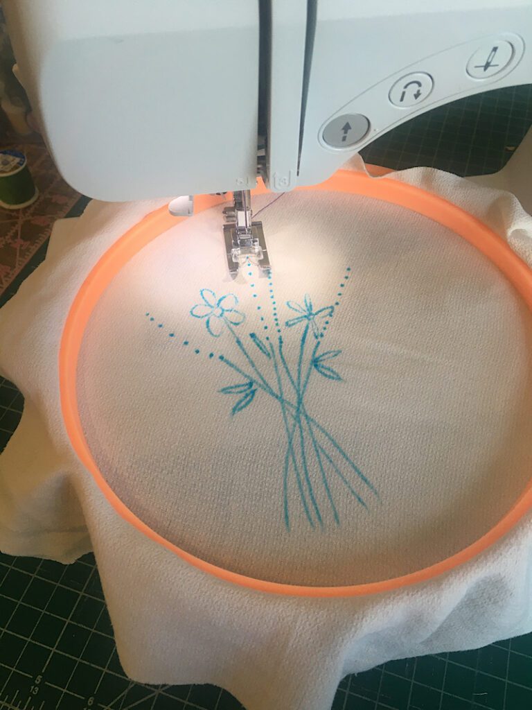 embroidery hoop under regular sewing machine